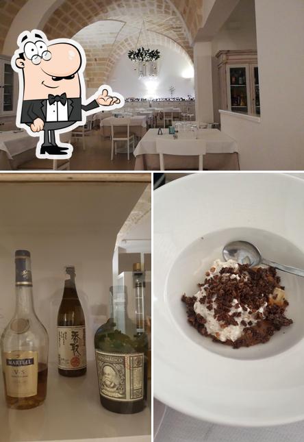 Dai un’occhiata alla foto che presenta la interni e bevanda di Essenza Ristorante