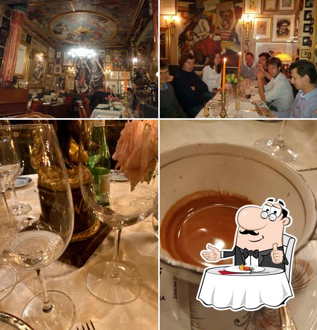 Questa è la immagine che mostra la tavolo da pranzo e bevanda di Ristorante Napoli