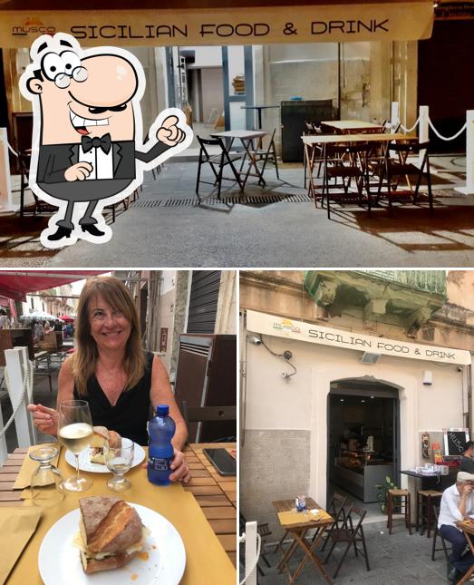 Guarda la foto che presenta la interni e tavolo da pranzo di Musco - Sicilian Food & Drink