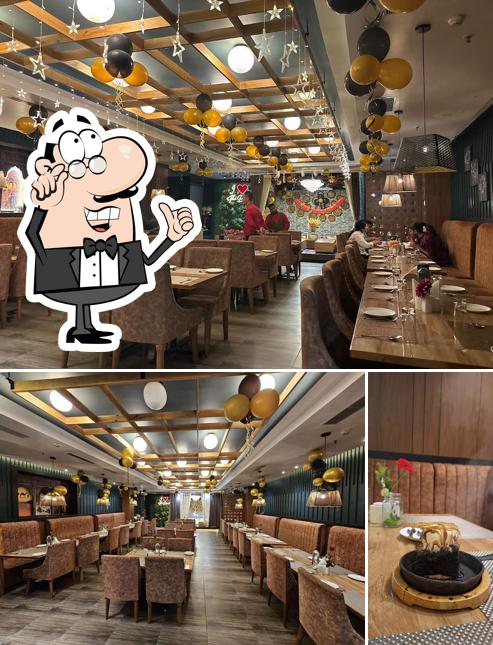 The photo of The Basiil - Pure Veg Restaurant Cum Bar’s interior and food