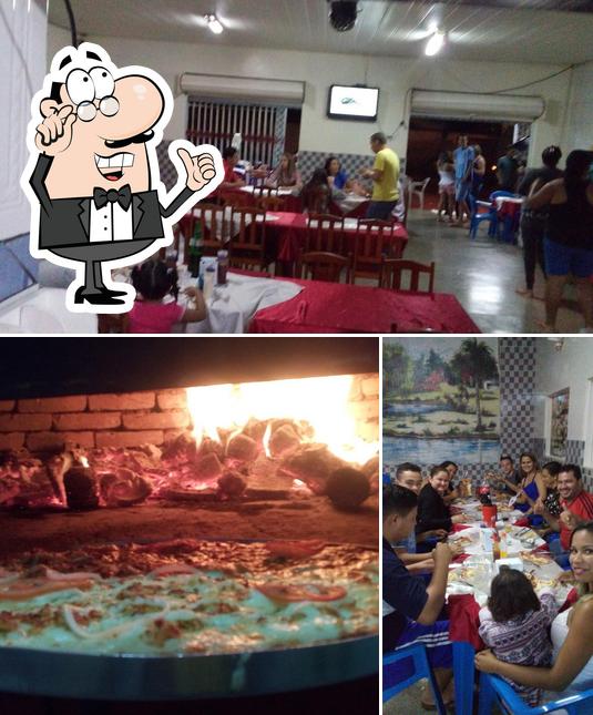 El interior de Pizzaria e Sanduicheria Bom Sabor