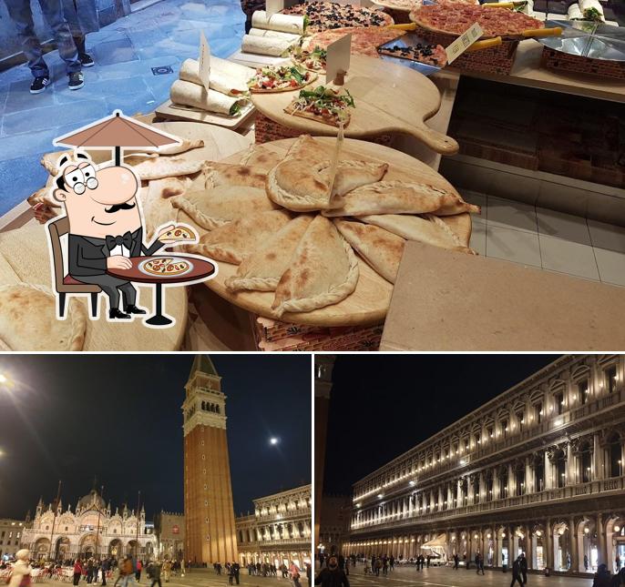 Tra le varie cose da Happy Pizza si possono trovare la esterno e cibo