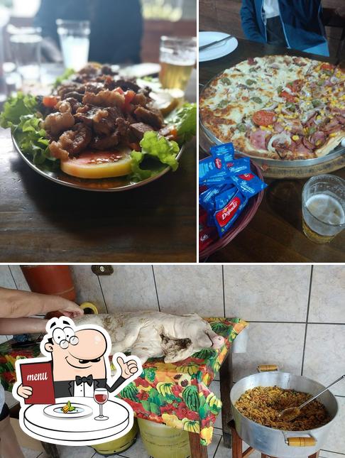 Esta é a imagem mostrando comida e interior no Stilo Mineiro