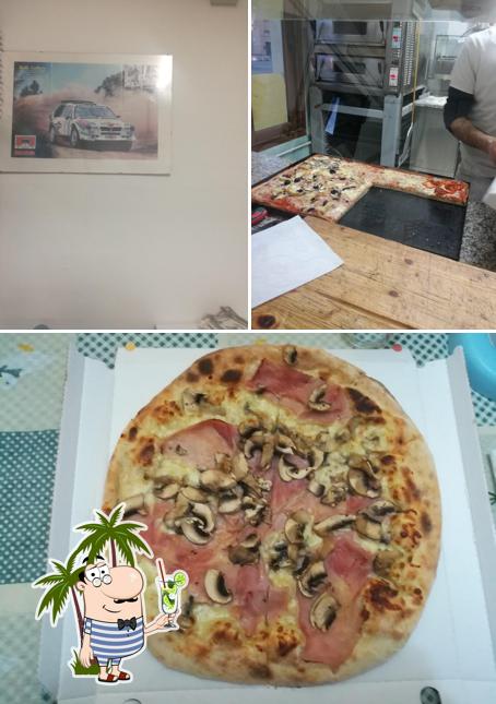 Guarda la foto di Pizza È