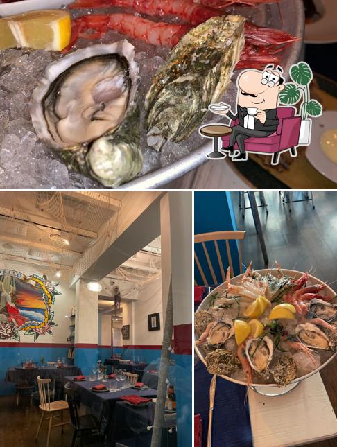 Guarda la foto che raffigura la interni e frutti di mare di Fello Mare