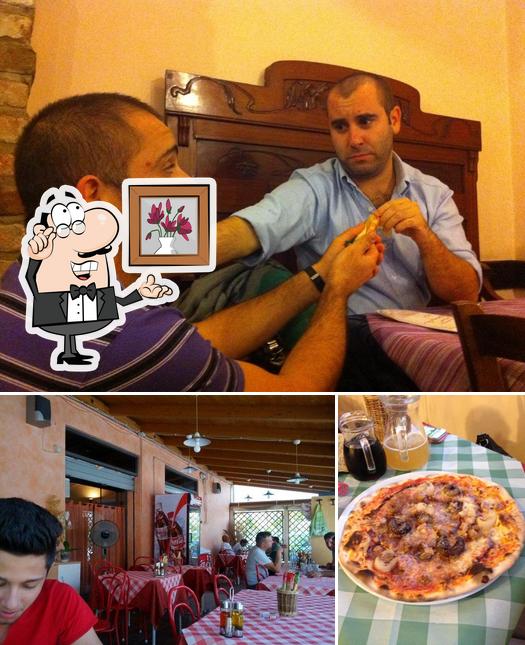 Questa è la foto che presenta la interni e pizza di Pizzeria - Pub Pappafico