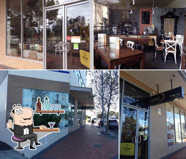 The photo of interior and exterior at Coco's Pizza Cafe