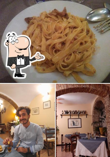 Questa è la foto che presenta la interni e cibo di Royal Ristorante Toscano