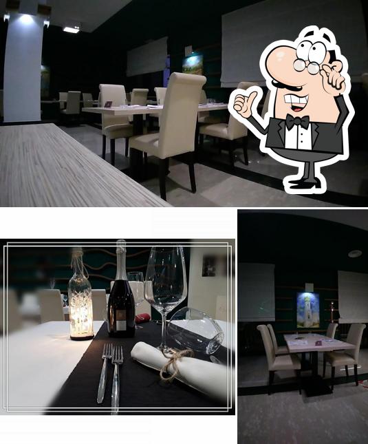 La foto di interni e vino da Ristorante Pizzeria Residence Giolì