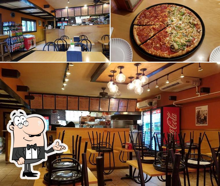 This is the photo displaying interior and pizza at Paxton House of Pizza