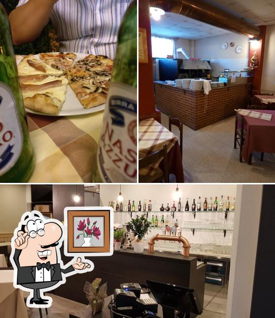 La foto della interni e alcol di Pizzeria Trattoria Dal Ghiottone