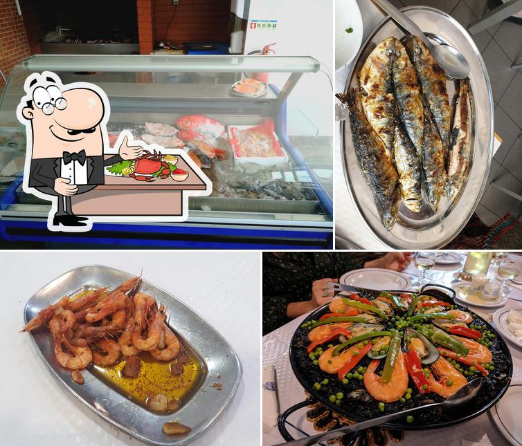 Отведайте блюда с морепродуктами в "João do Peixe"