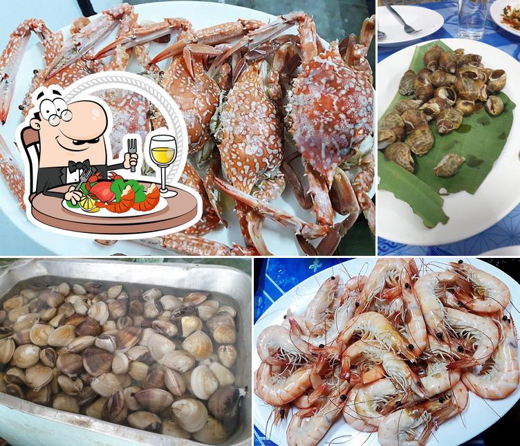 Попробуйте блюда с морепродуктами в "โข่ว โข่ว เซียนซีฟู้ด (Koukouxian Seafood)"