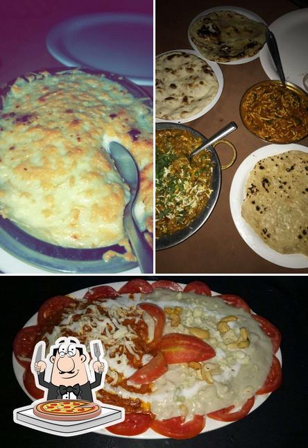 Try out pizza at New Sanjha Chula Garden Restaurant