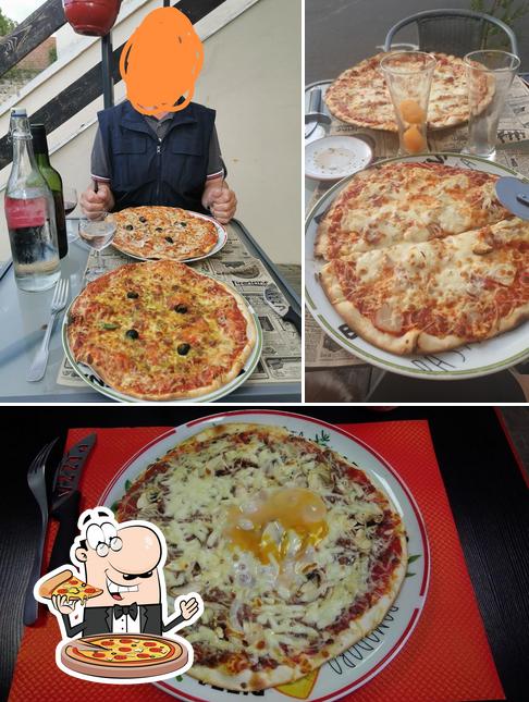 Prenez des pizzas à Arôma Pizza