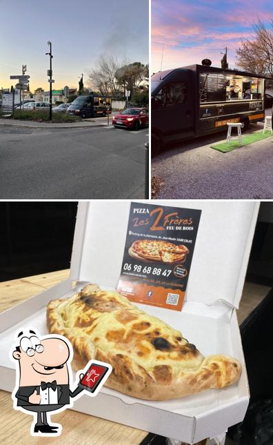 Voici la photo affichant la extérieur et nourriture sur Pizza les 2 frères Cabriès / Calas - Feu de bois - livraison gratuite - CB sans minimum