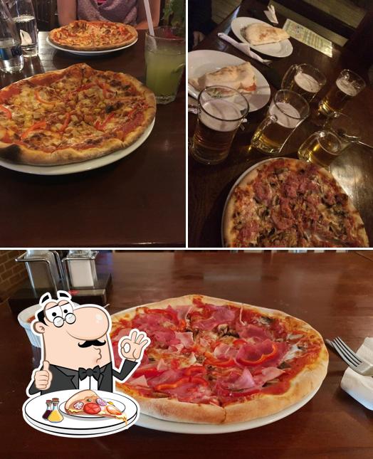 Probiert eine Pizza bei Manhattan Pub & Pizza