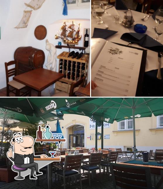 La photo de la intérieur et table à manger de Panagiotis Kasiris - Der Grieche’s