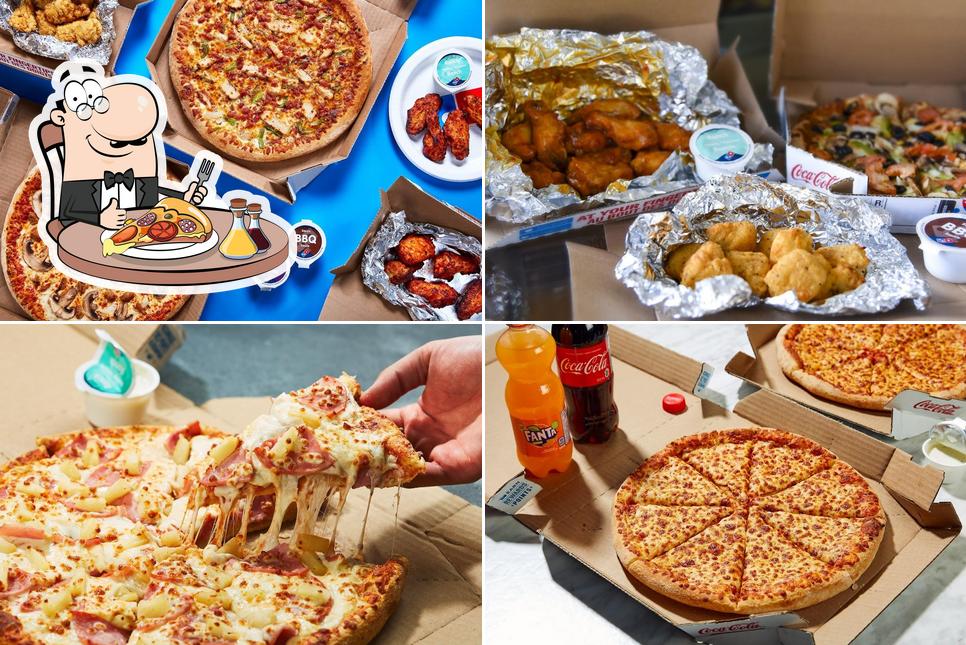 A Domino's Pizza, vous pouvez essayer des pizzas