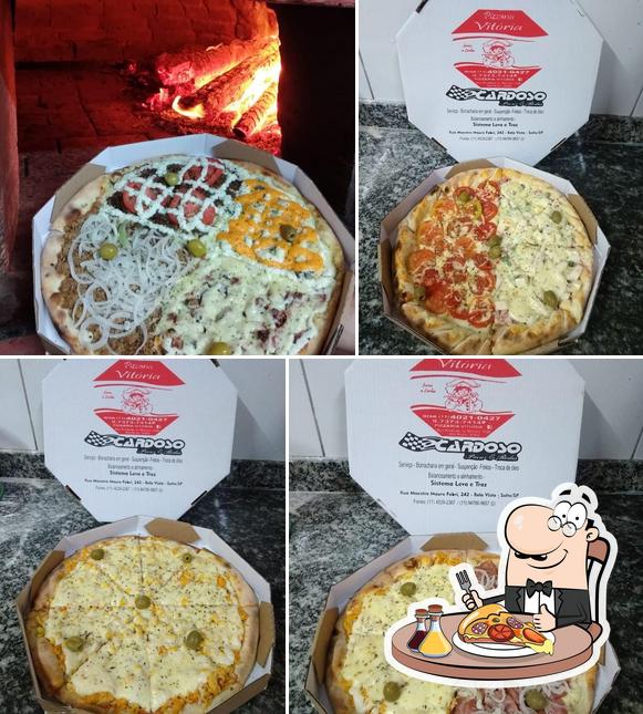 Try out pizza at Pizzaria Vitoria