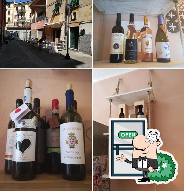 Guarda la foto che mostra la esterno e bevanda di Caffè Evora Garnì