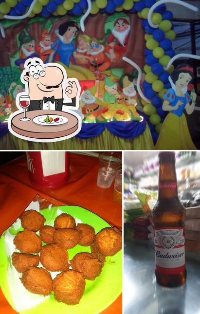 Entre diversos coisas, comida e cerveja podem ser encontrados a Di Yuri's Pizzaria