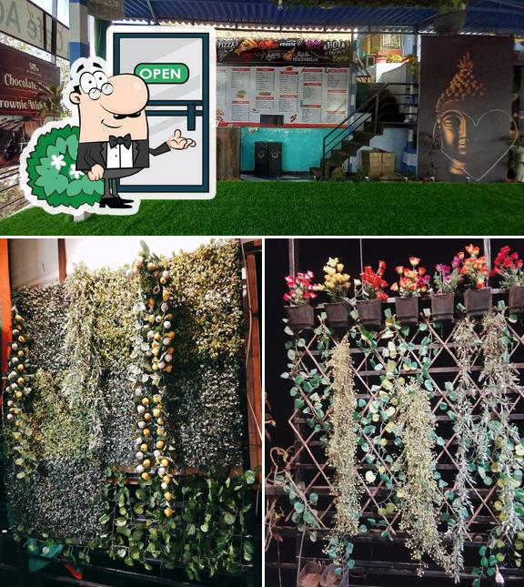 Check out the image displaying exterior and food at Cafe Adda