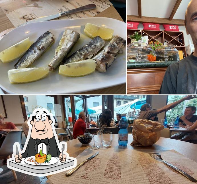 Tra le diverse cose da Osteria degli Artisti si possono trovare la cibo e interni