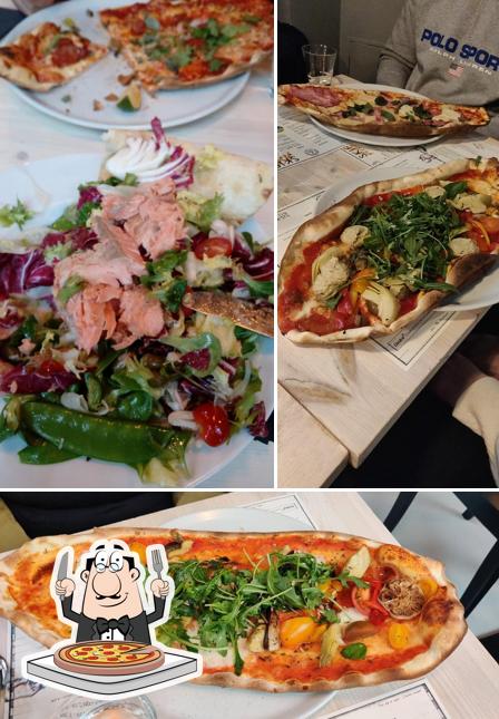 Get pizza at Skiffer Kallio