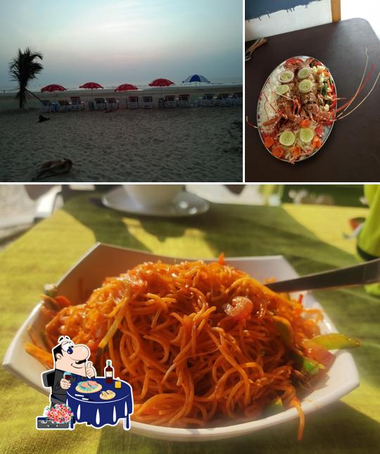 Try out seafood at Bare Feet Beach Shack