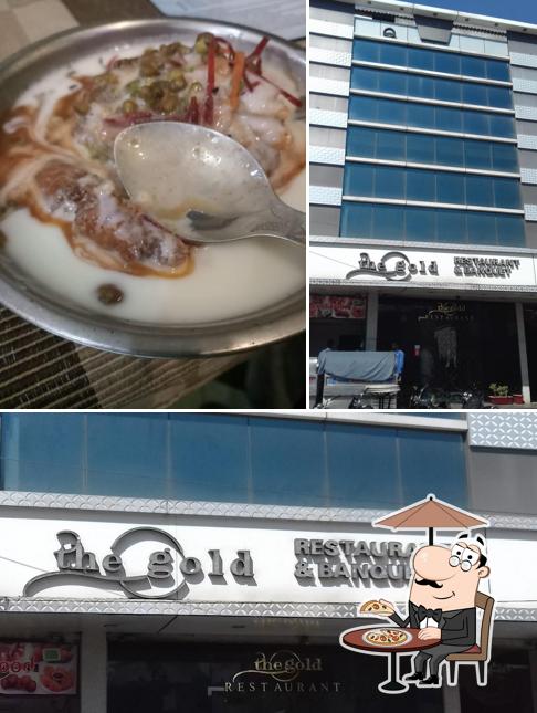 This is the picture depicting exterior and food at Gold Restaurant