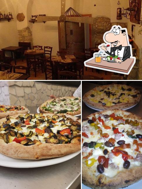 Dai un’occhiata alla foto che presenta la cibo e tavolo da pranzo di Pizzeria Don Chisciotte