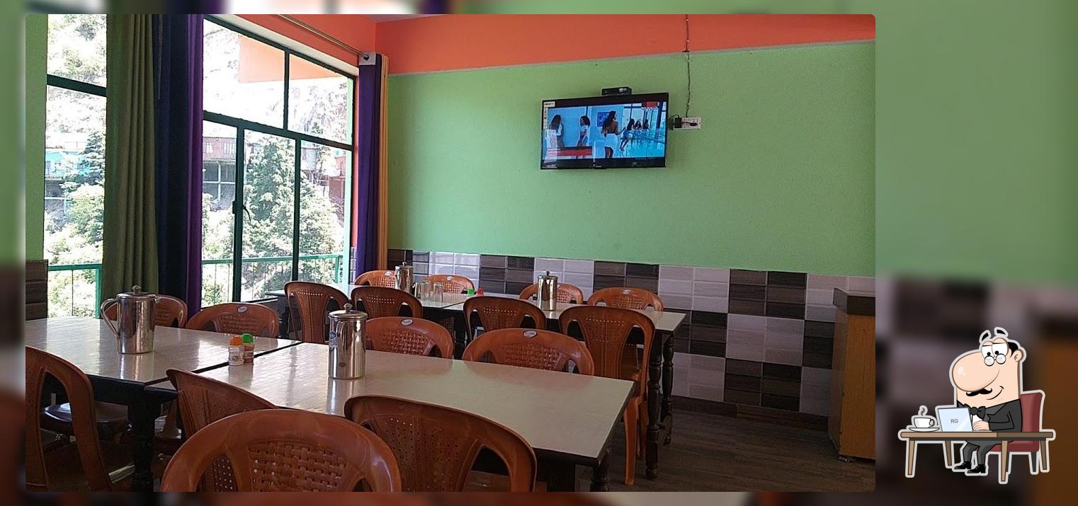 Take a seat at one of the tables at Everest Restaurant