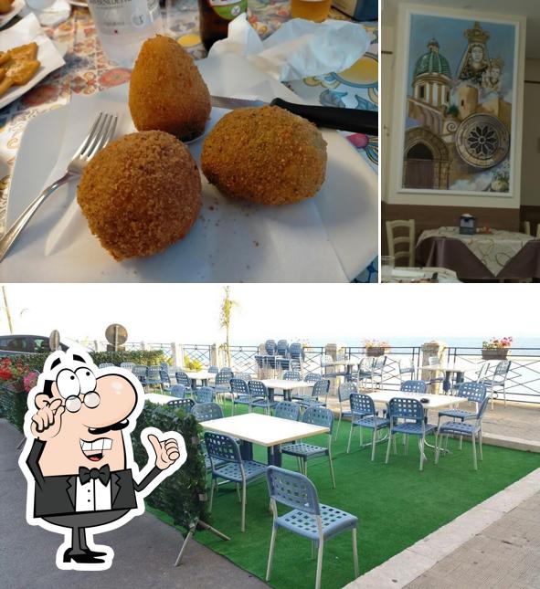 Siediti a un tavolo di Pizzeria Bellavista