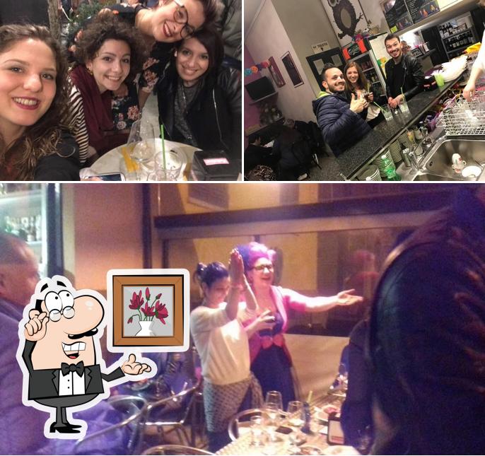 Dai un'occhiata agli interni di Gufo Bar
