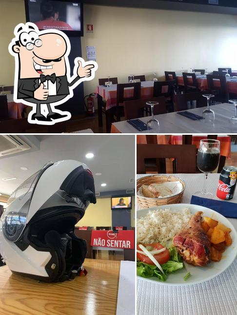 Взгляните на снимок ресторана "Churrasqueira Sao Jorge"