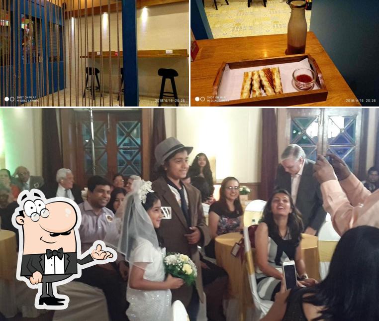 This is the photo depicting interior and wedding at Turf Club House Restaurant