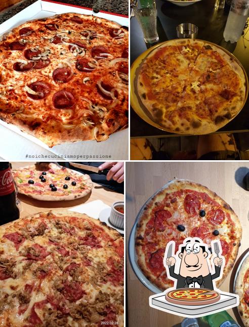 A Pizzeria al Centro, puoi assaggiare una bella pizza