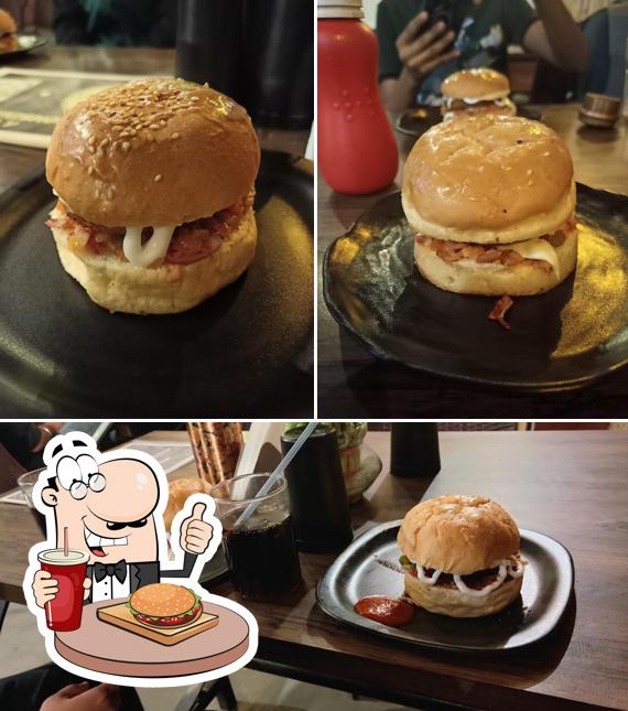 Order a burger at Dhaba Cafe