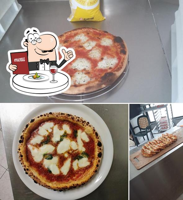 La immagine della cibo e interni di Pizzeria Al Kamin