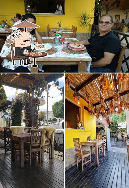 Confira a ilustração ilustrando exterior e mesa de jantar no Giardino Restaurante