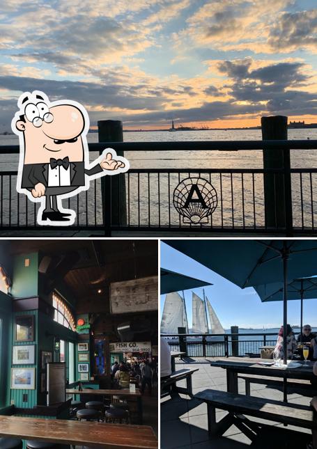 The photo of interior and exterior at The Oyster House at Pier A