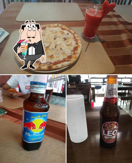 Estas son las fotografías donde puedes ver bebida y pizza en Cozi Italia