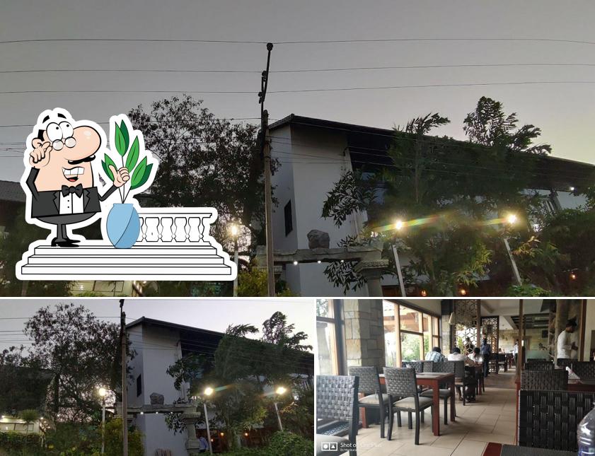 The image of Alankar Veg Restaurant’s exterior and interior