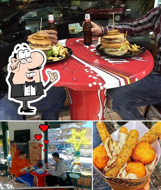 La foto di interni e cibo da Pizzeria Panineria Hamburgeria dai Briganti