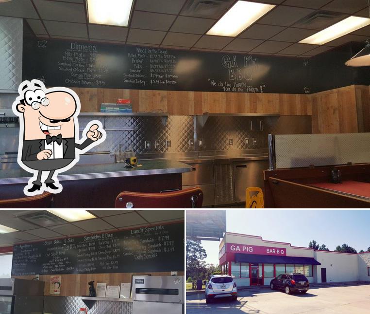 Check out the picture displaying interior and exterior at GA Pig BBQ