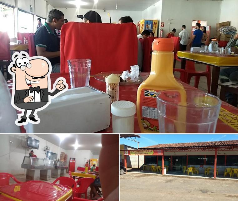 Dê uma olhada a foto apresentando interior e exterior no Churrascaria gordinho