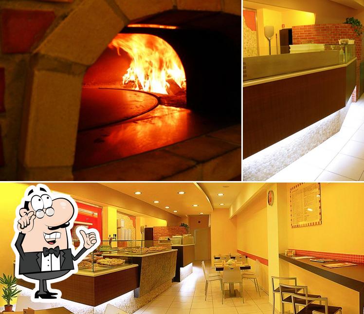 Gli interni di Pando's Pizza...forno a legna