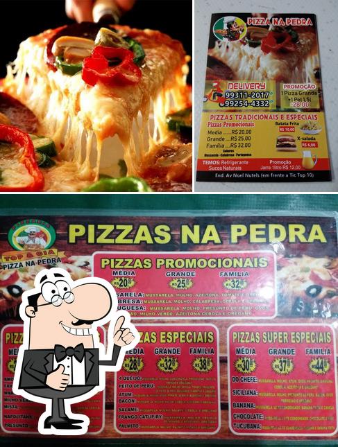 Look at the picture of Pizzaria Top & Cia - Pizza na Pedra