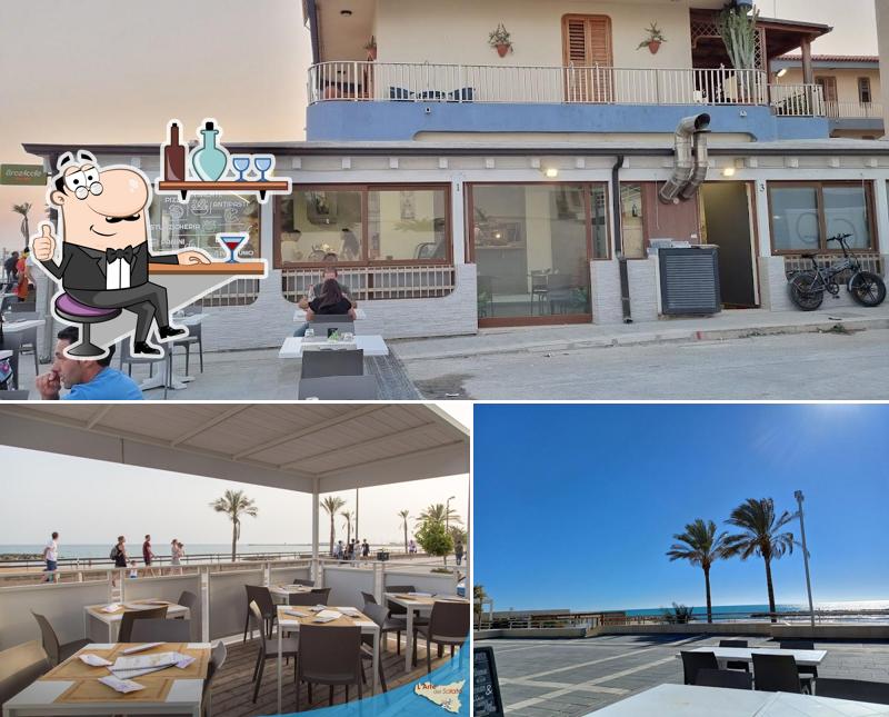 La foto della interni e esterno di L'Arte del Salato - Pizzeria vista mare